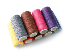 Color threads on white background