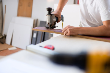 Cutting the plywood with Jigsaw