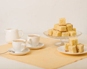 Homecooking banoffee with coffee. Banana biscuits squares.