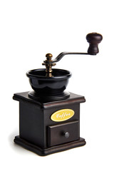 Grinder with coffee beansю./A hand grinder with coffee beans.