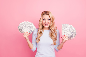 Portrait of glad shopaholic, carefree girl in casual outfit holding two fan from a lot of, much...