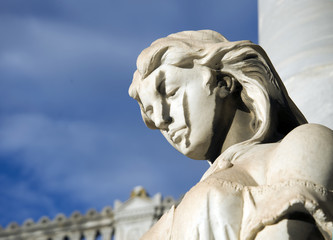 Old statue of angel inside the monumental cemetery of the Certosa di Bologna. The public cemetery was established in 1801. BOLOGNA, ITALY