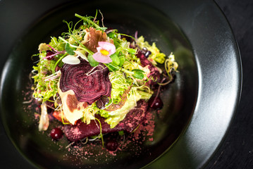 Fresh tasty salad dish with vegetables and herbs