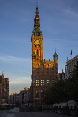 Fototapeta na wymiar View of the beautiful tower of the City Hall at dawn of Gdansk. Poland