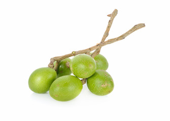 whole fresh hog plum with stem on white background