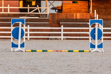 Show jumping barriers on the ground. Arena for equestrian sports