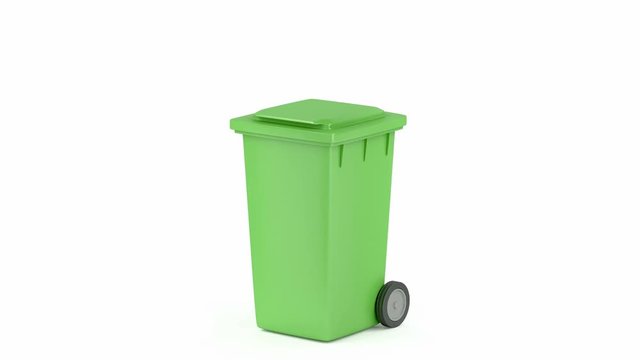Green plastic waste container on white background