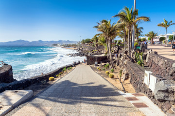 boardwalk and beach in Puerto del Carmen, Lanzarote, Spain