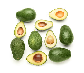 Ripe avocados on white background, flat lay