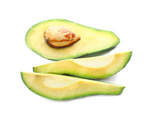 Pieces of ripe avocado on white background