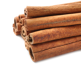 Cinnamon sticks on white background