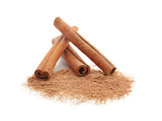 Cinnamon sticks and powder on white background