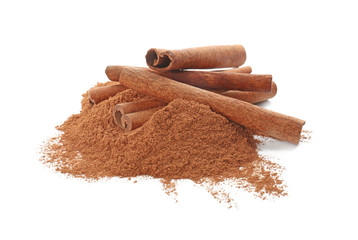 Cinnamon sticks and powder on white background
