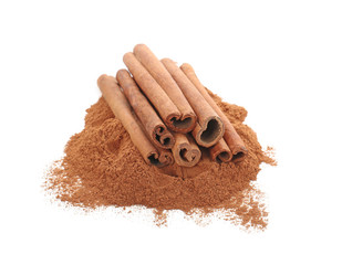 Cinnamon sticks and powder on white background