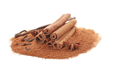Cinnamon sticks and powder on white background