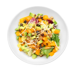 Plate of tasty salad with ripe avocado on white background