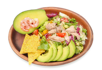 Plate of tasty salad with ripe avocado on white background