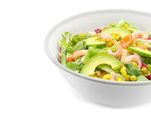 Bowl of tasty salad with ripe avocado on white background