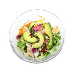 Glass bowl of tasty salad with ripe avocado on white background