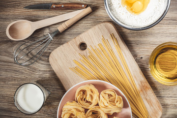 preparation recipe bread, pizza, spaghetti making ingridients, food flat lay on kitchen table...