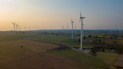 Wind turbine farm and agricultural fields. aerial shot