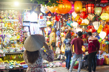 Tourist is traveling in Hoi An Old town in Vietnam.