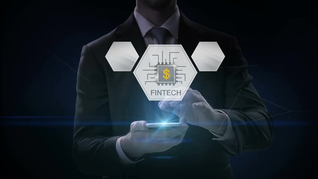 Businessman click smart phone, mobile, Fin-tech icon and various graph. Futuristic financial technology. 4k movie. version 1.