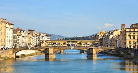 Fototapeta na wymiar famous Ponte Vecchio old bridge in Venice on Arno River with old architecture, Italy