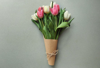 Bouquet of beautiful tulips on grey background