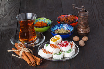 Tea in traditional armudu glass with sweets