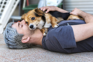Beautiful hug of a man and his beloved dog.