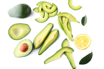 Pieces of ripe avocado on white background