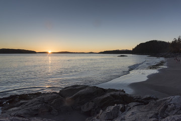 Obraz premium Scenic view of the beach at sunset, Tonquin Beach, Tofino, Vancouver Island, British Columbia, Canada