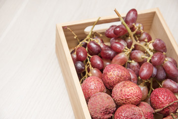 Lychee on wooden floor