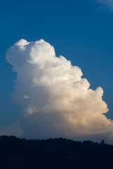Cumulonimbus in dramatic sunset and mountain silhouette in central america, Guatemala.