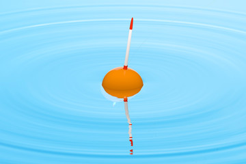 Realistic 3D render of the fishing bobber on a water surface