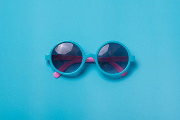 The glasses are on the blue background