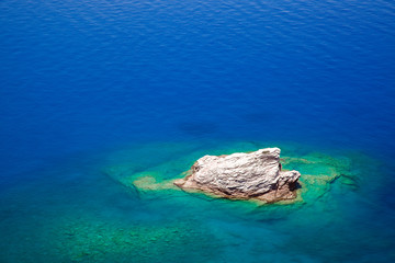 Rock island and beautifu lblue sea, Kabak, Turkey