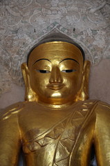 Ancient golden Buddha. Statue of 14th century. Bagan, Myanmar