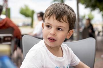 Little boy posing in the park