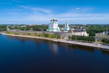 Fototapeta na wymiar The Pskov Kremlin in the city landscape on a sunny June day. Pskov, Russia