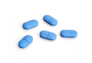 Coloured pills isolated on white background