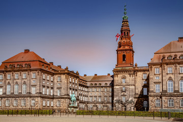 Fototapeta premium Urban scene with historical Christiansborg Palace and blue sky in Copenhagen, denmark