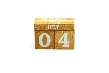 4 July text on wooden cubes. USA independence day. isolated copy space for text.