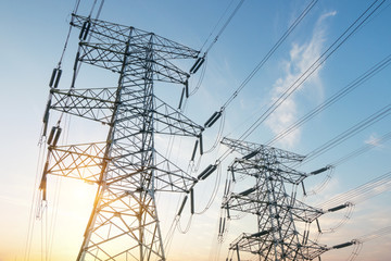 High pressure wire tower at sunset at dusk