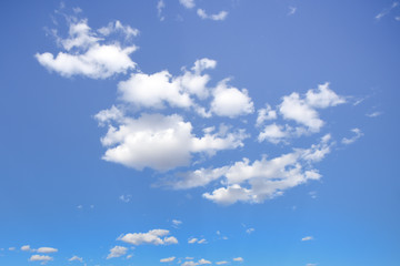 Blue sky and puffy clouds. Background for everything environmental, healthy, serene