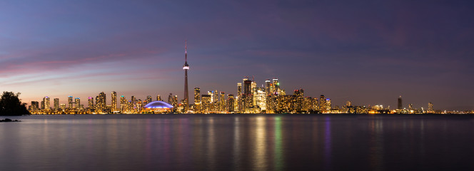 Fototapeta na wymiar Skyline of Toronto at Night Panorama Blue Hour Canada