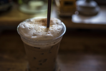 A photo close up near a brown coffee with drinking colors