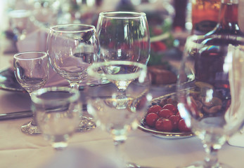 glasses and bottles on the table