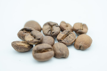 Close up of coffee bean on white background.